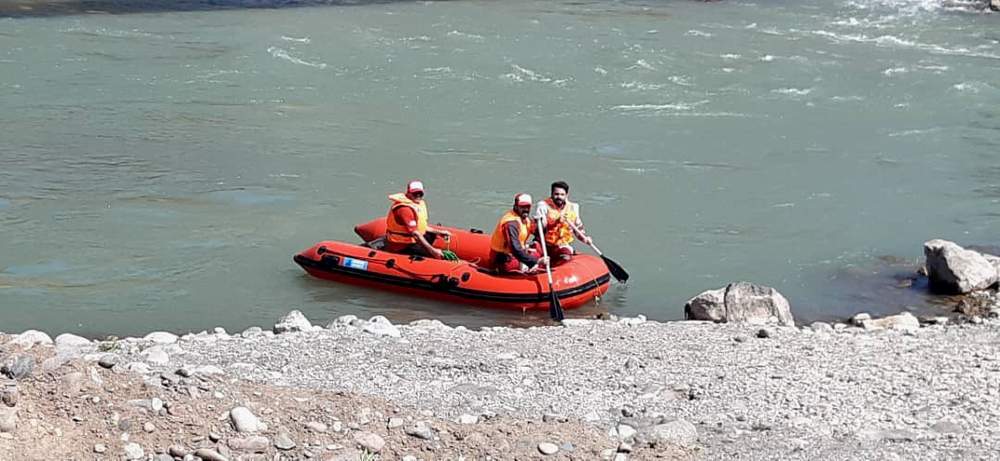 Rescuers rush to save affected people in roaring rivers of North
